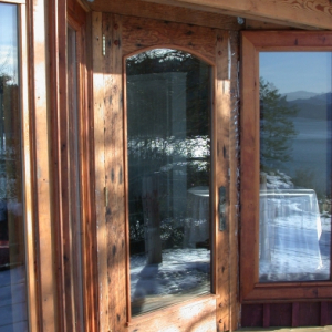 Exterior Glass Wood Entrance of West Coast Home on Pender Island built by Dave Dandeneau of Gulf Islands Artisan Homes